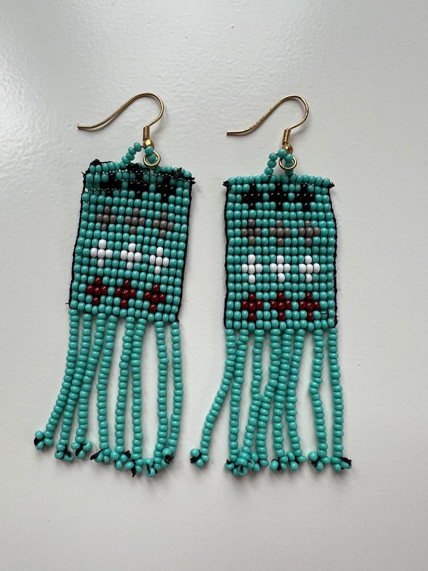 Light blue with crosses hanging beaded earrings